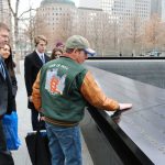 Volunteer Dan, along with teachers and students. paying their respects at the 9/11 Memorial