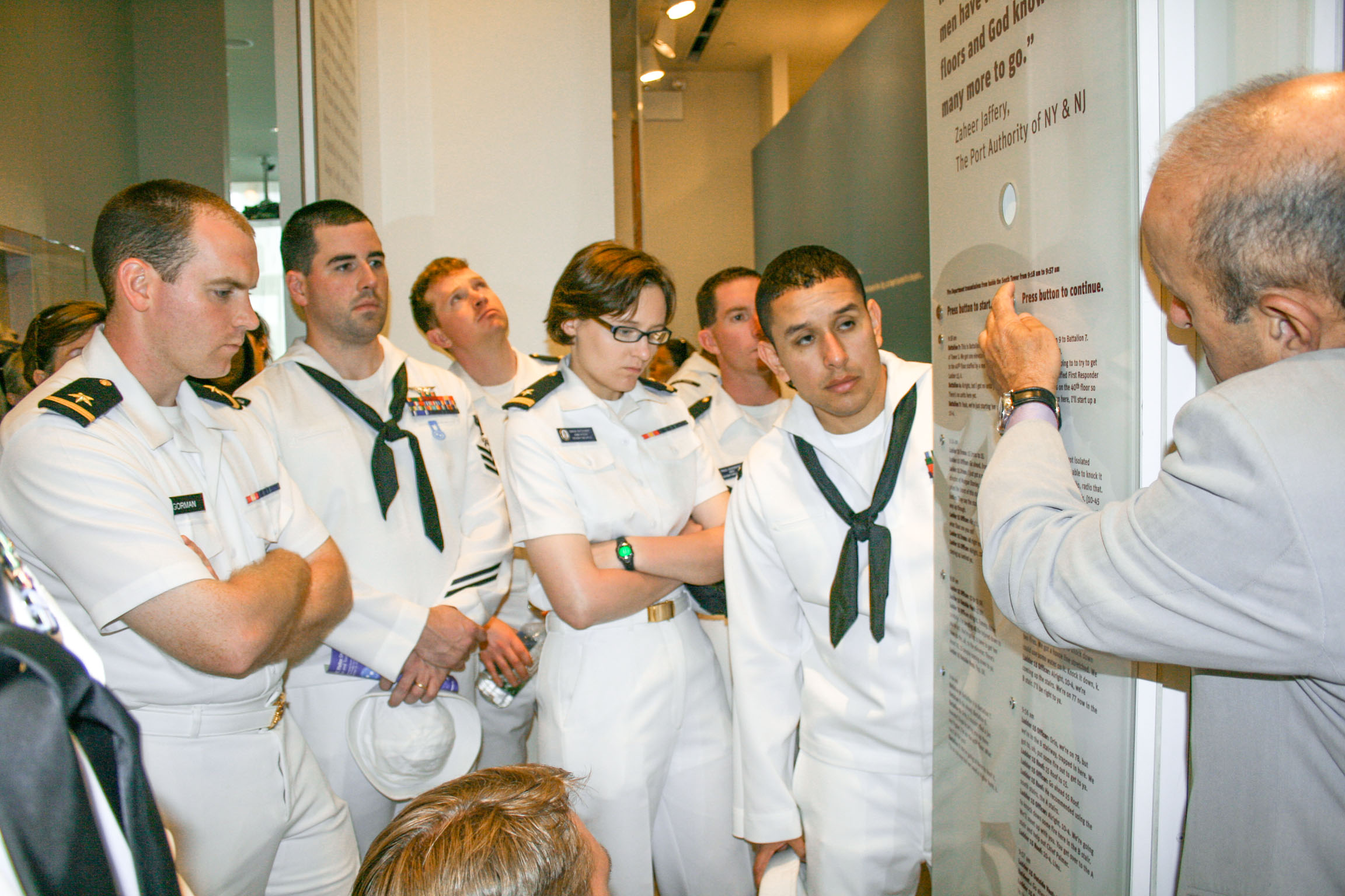 Crew members of the USS New York with Lee Ielpi at the 9/11 Tribute Center.