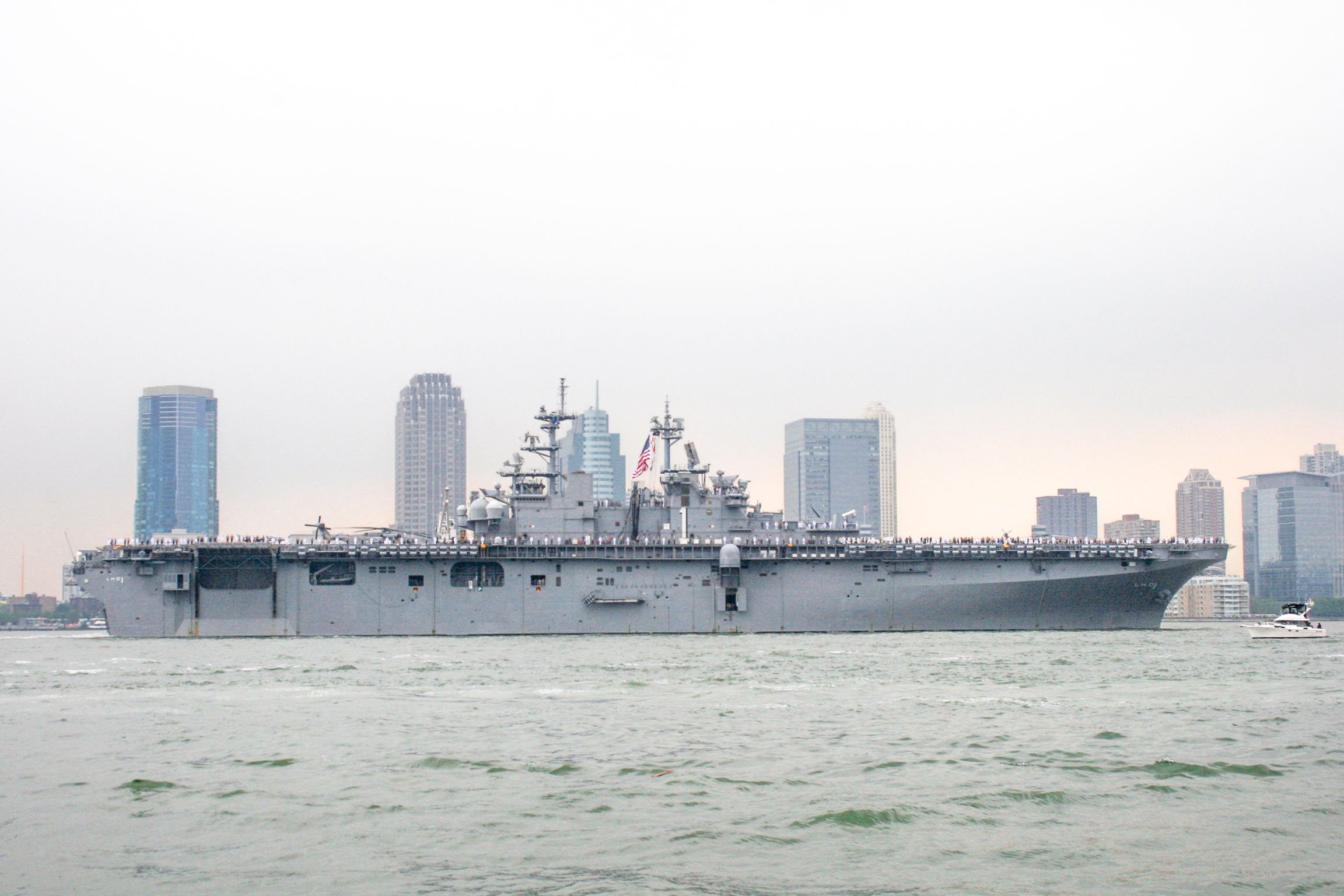 USS New York coming into New York harbor.